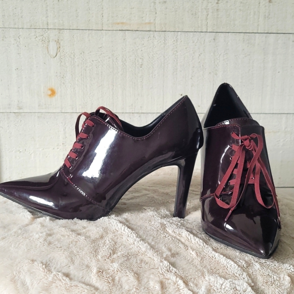 Le Chateau Bordeaux colored ankle booties.